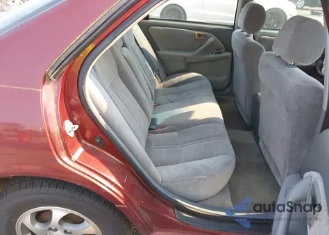 1999 Toyota Camry Le from USA, damaged, VIN 4T1BG22K7XU611639